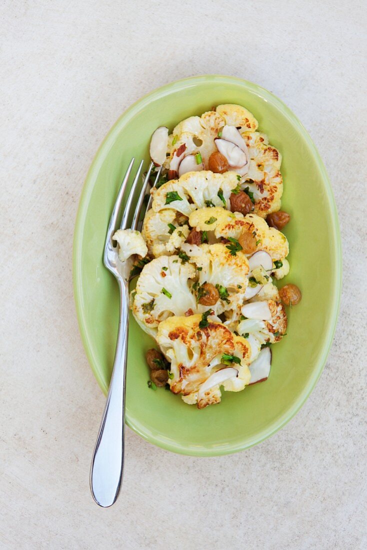 Fried cauliflower with an almond and raisin vinaigrette