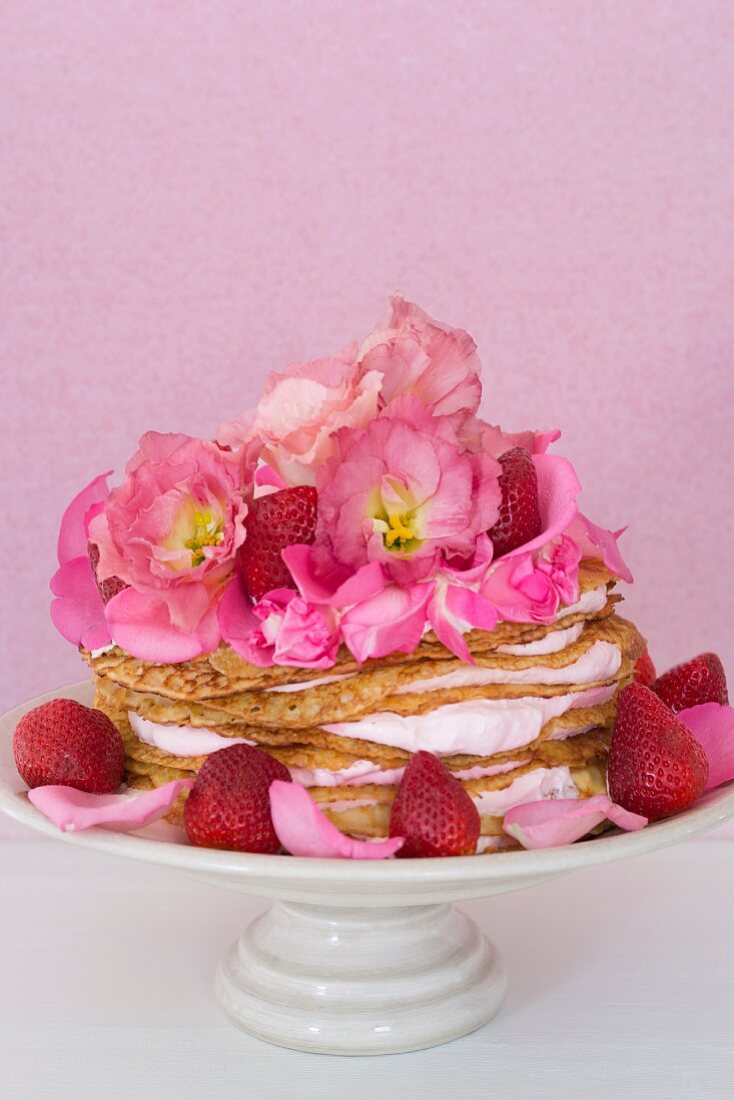 A pancake cake with strawberries and mascarpone