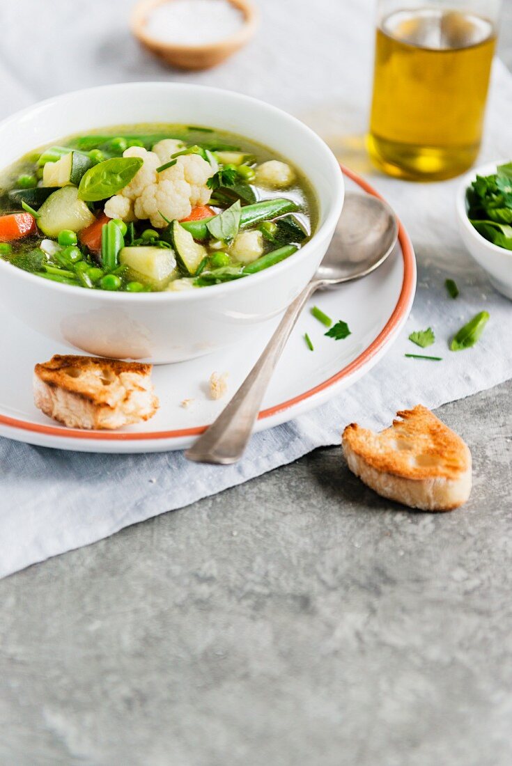 Minestrone with cauliflowers and basil