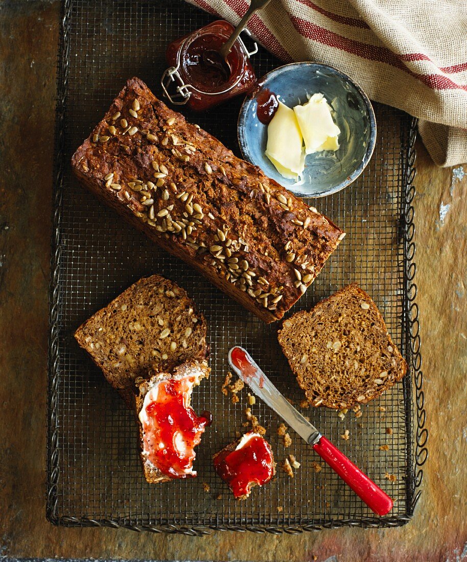Walnut bread with butter and jam (seen from above)