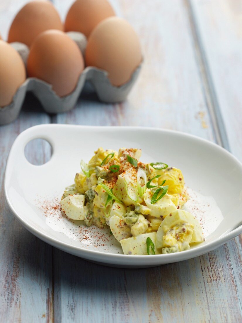 Egg salad with spring onions and a mustard dressing