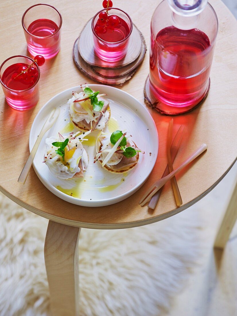 Blinis with smoked herring and redcurrant vodka