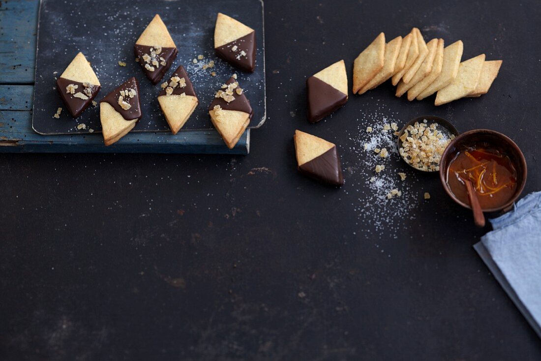 Short crust diamond biscuits dipped in chocolate with marmalade