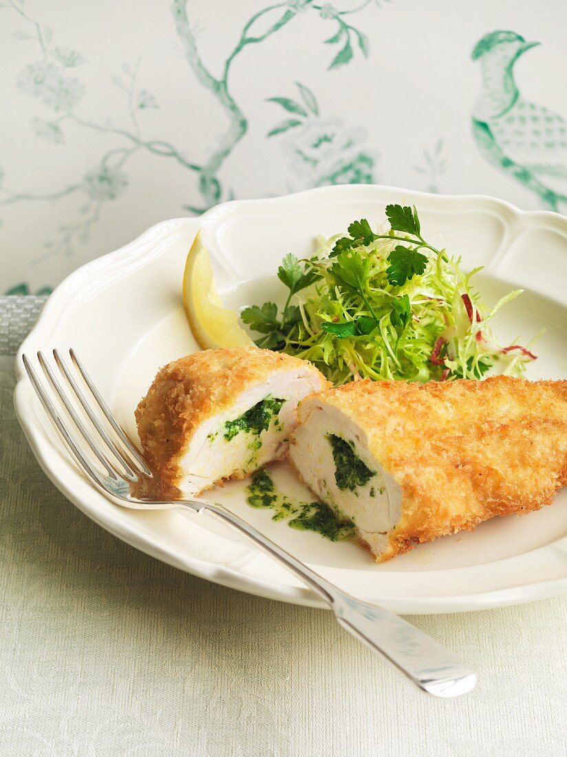 Chicken kiev with a herb salad