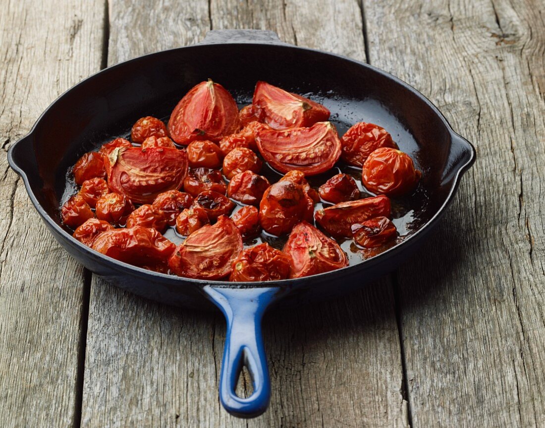 Fried tomatoes in a pan