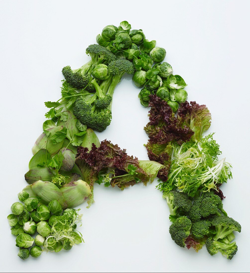 The letter A made from green vegetables and lettuce