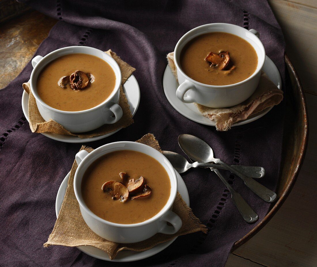 Three cups of chestnut soup with mushrooms