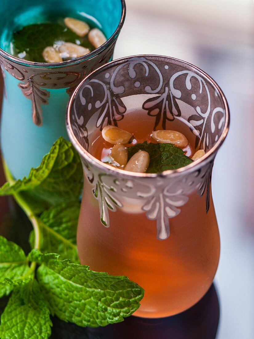 Peppermint tea with pine nuts