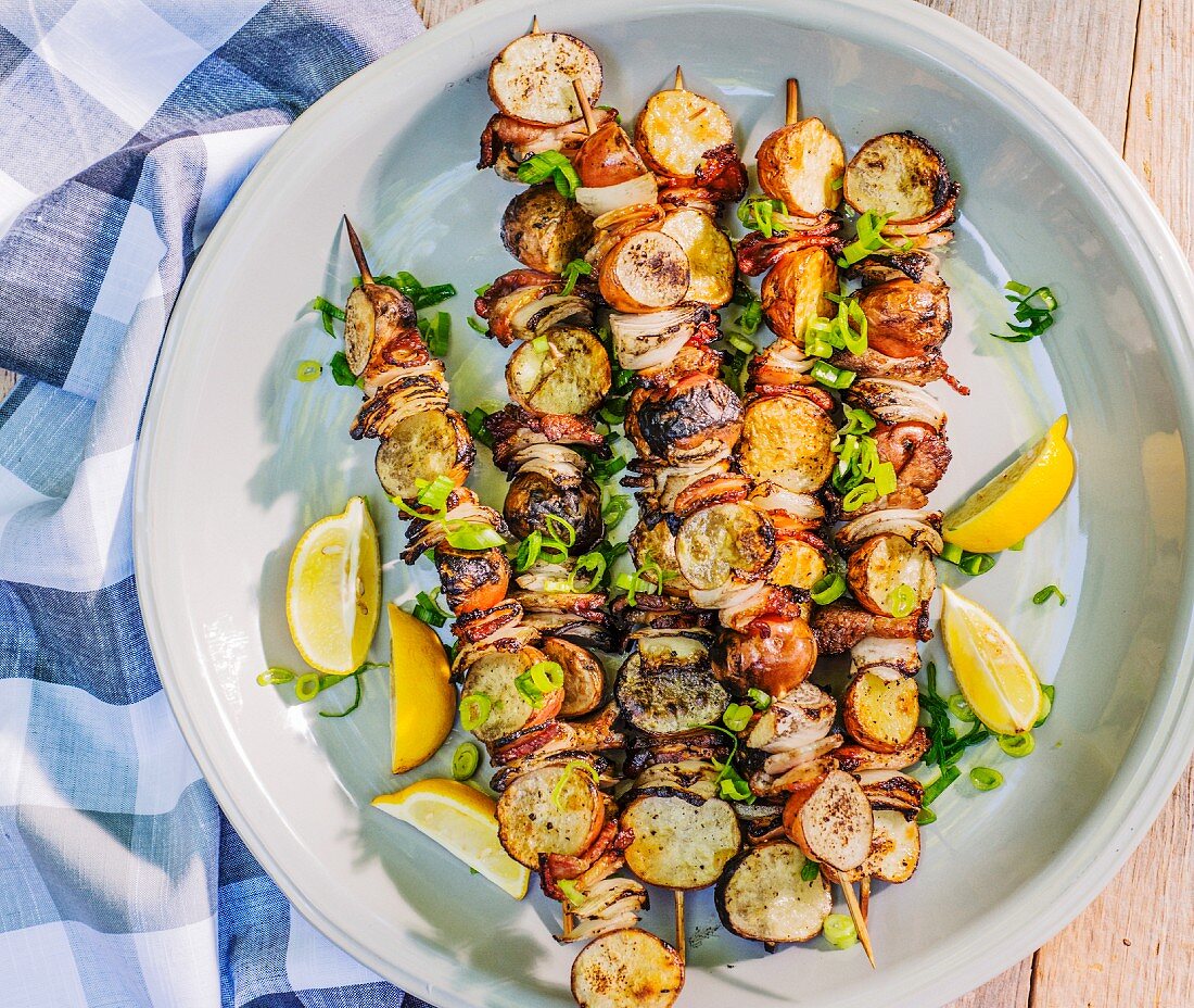 Grilled potato skewers with onions