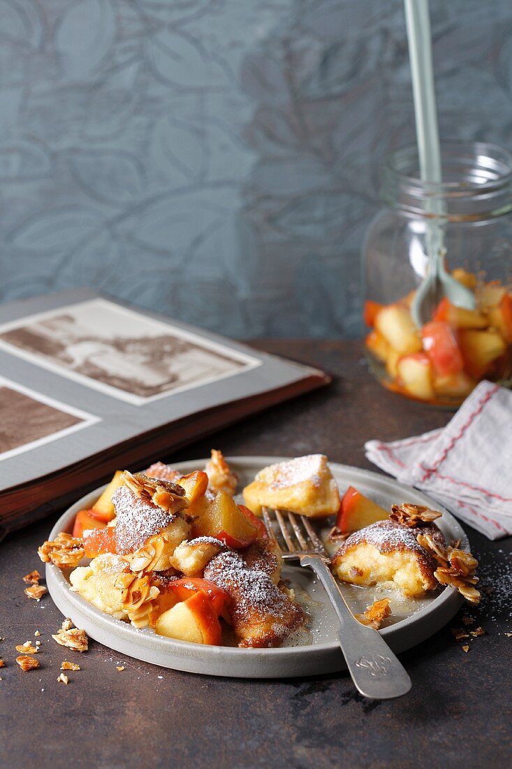 Kaiserschmarren (shredded sugared pancake from Austria) with apples and caramelised almonds