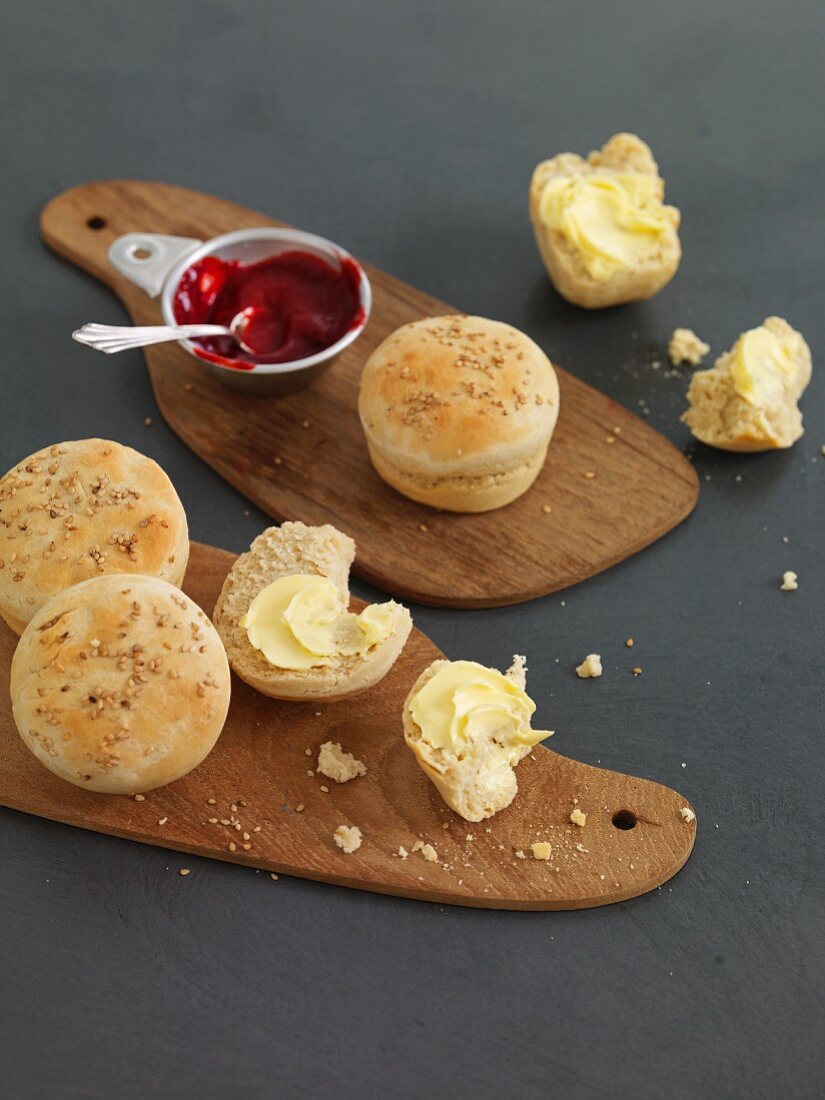Breakfast rolls with butter and jam