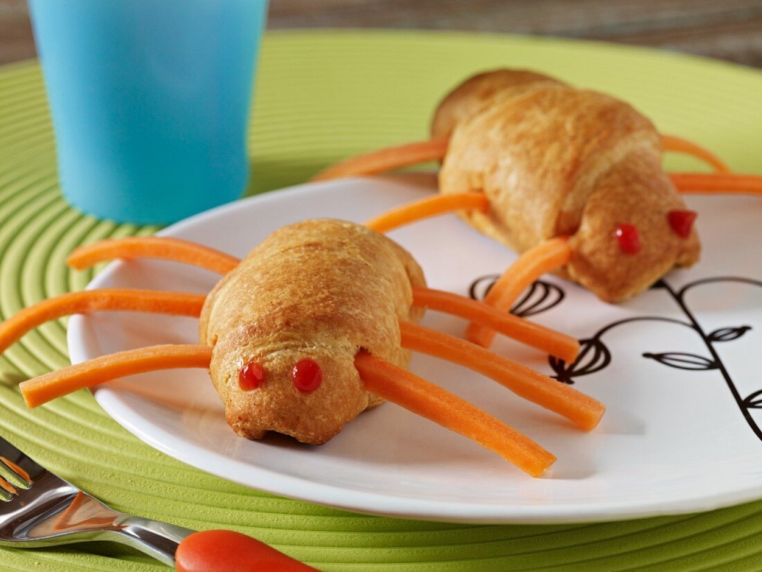 Stuffed croissants with cheese and ketchup (children's snack)
