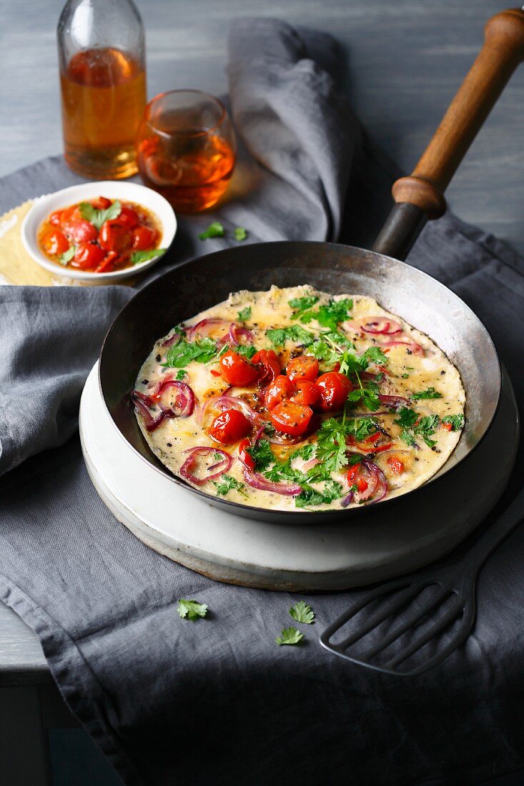 An omelette with quick tomato chutney