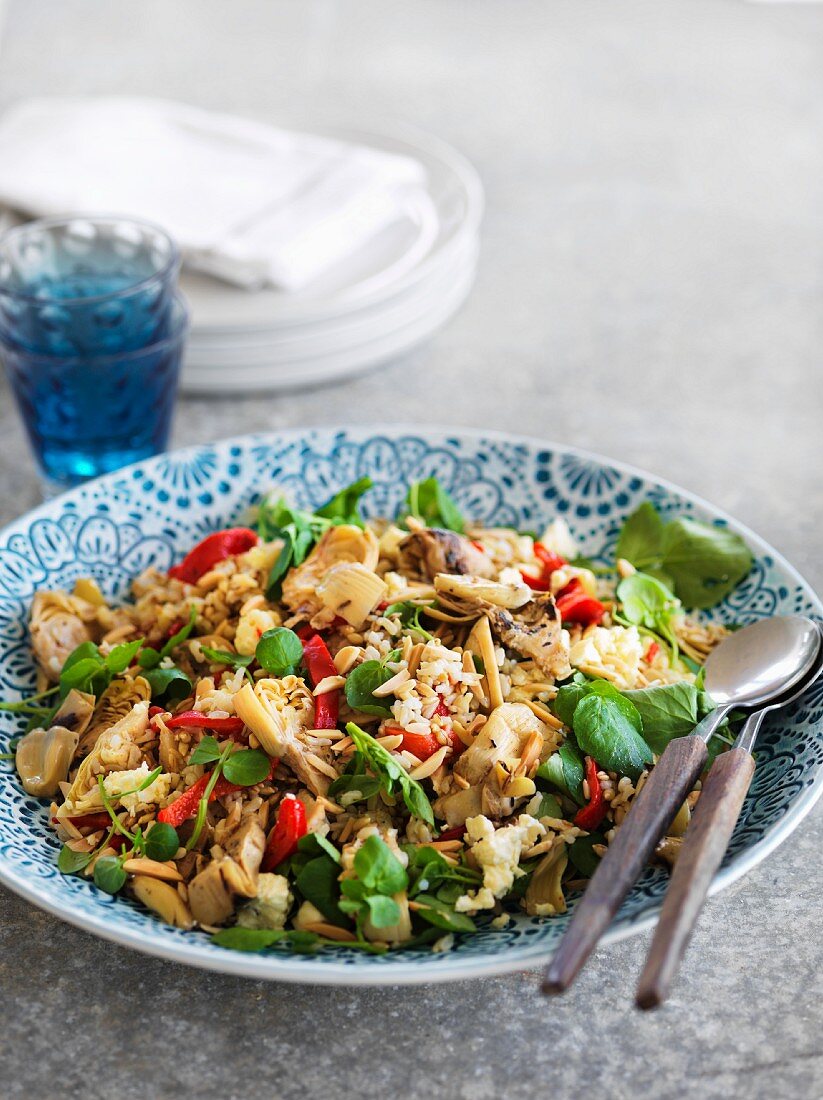 Artichoke salad with peppers and basil