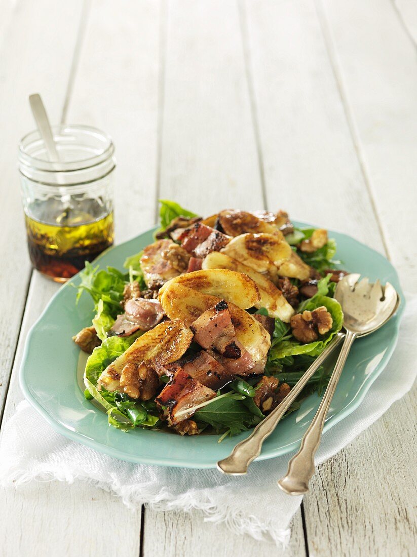 Bacon and banana salad with maple syrup and a walnut dressing