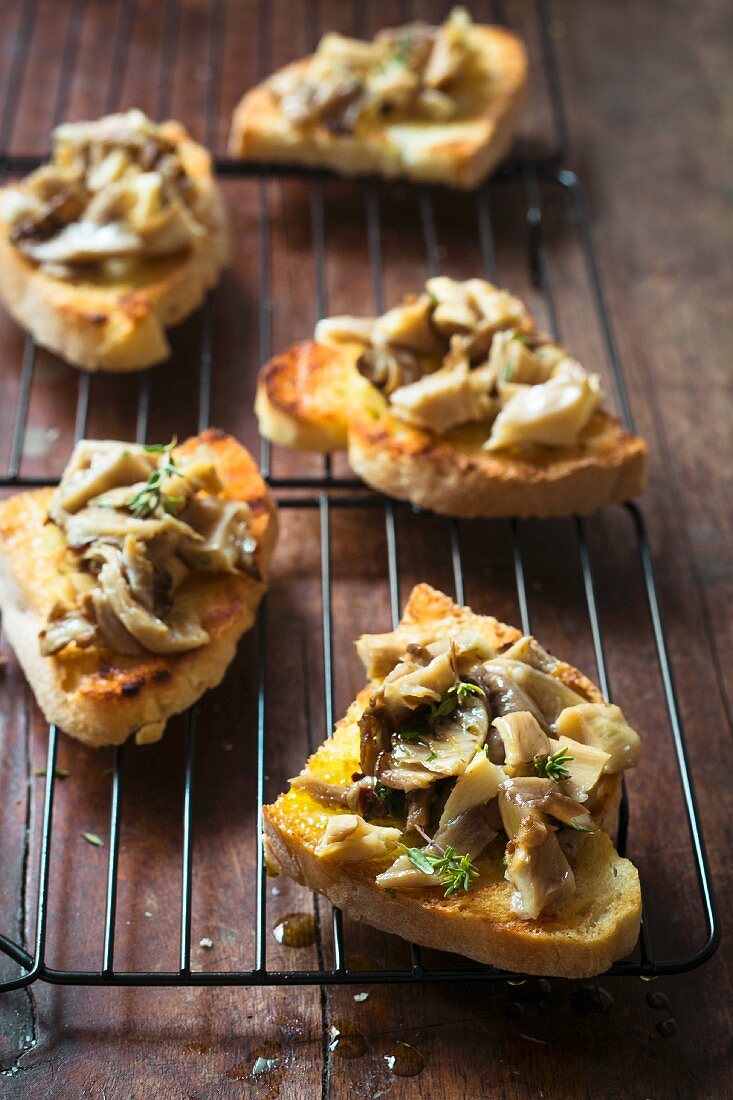 Crostini ai funghi (grilled bread topped with porcini mushrooms, Italy)
