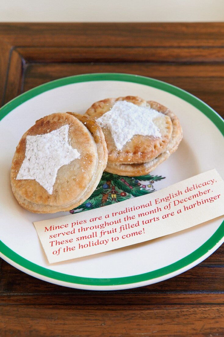 Mince pies and a description on a Christmas plate