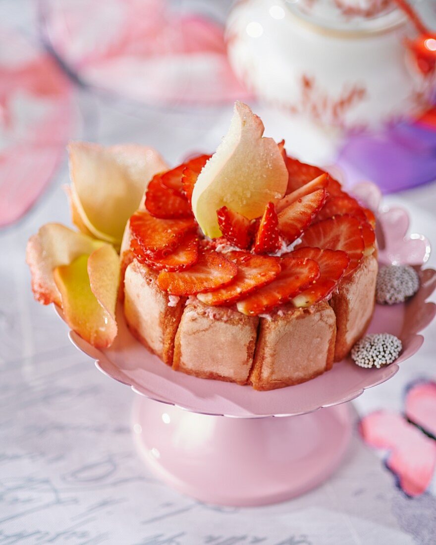 Strawberry charlotte with rose petals