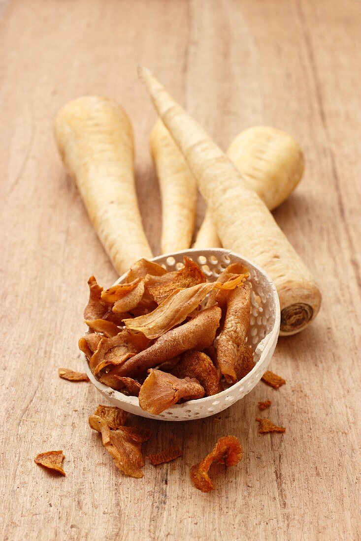 Fresh parsnips and parsnip crisps