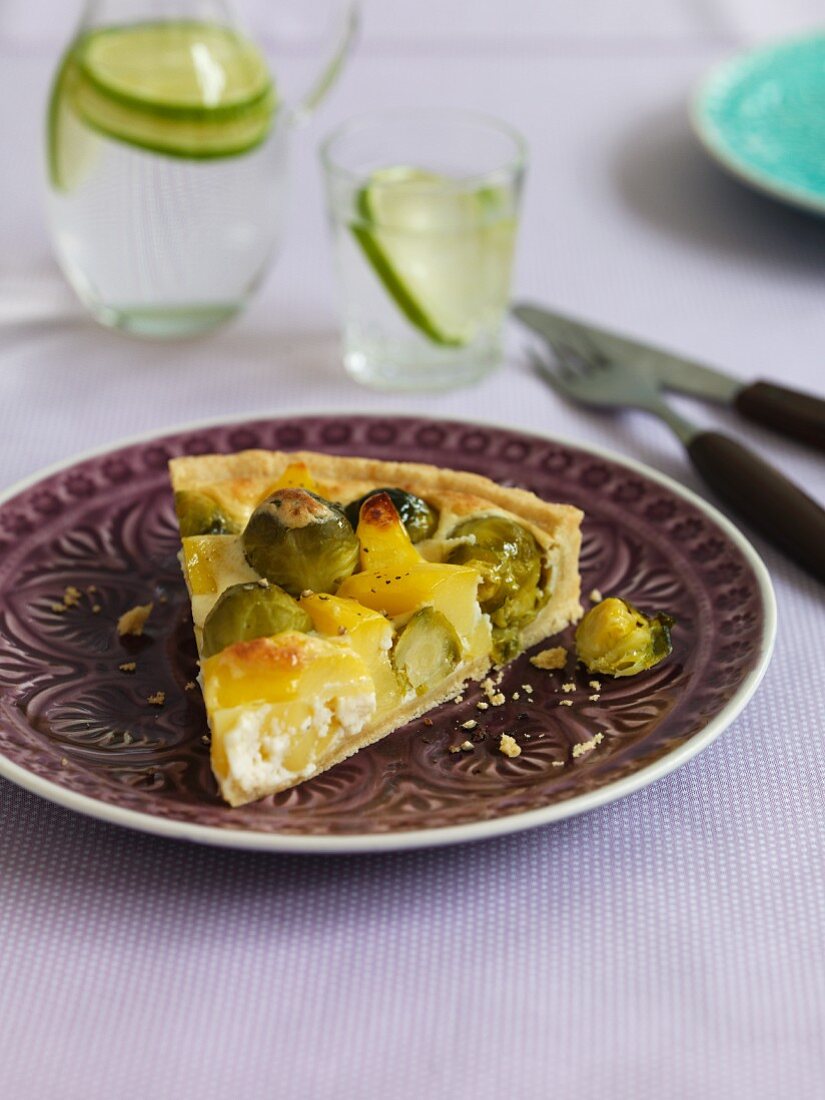 A slice of vegan Brussels and potato quiche
