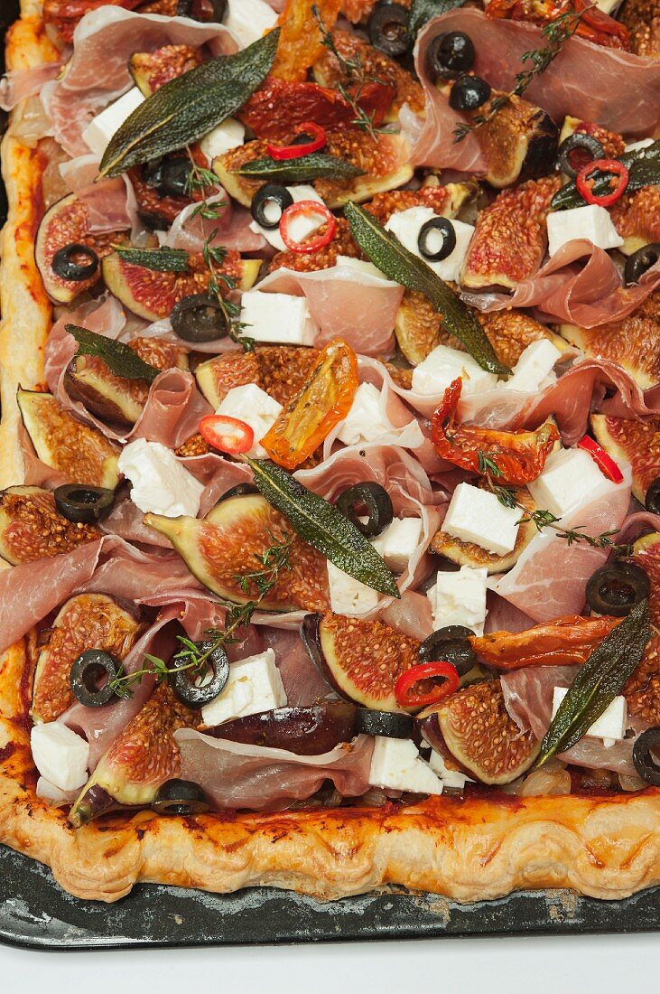 Pissaladiere with riccotta, feta, figs, onions and olives