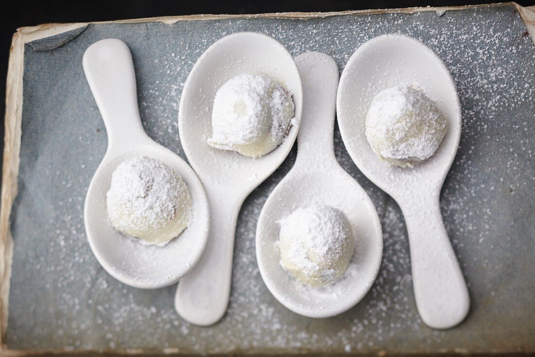 White honey truffles on spoons