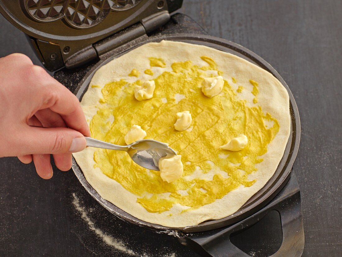 A Croque Monsieur waffle being made