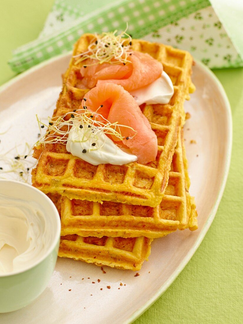 Carrot waffles with smoked salmon and crème fraîche