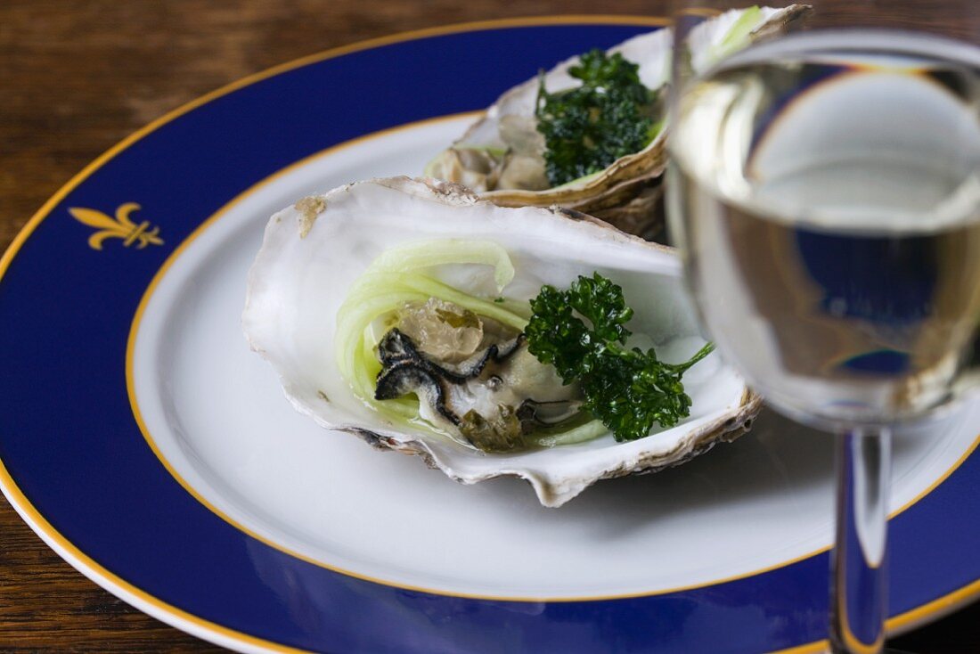 Poached oysters with cucumber strips