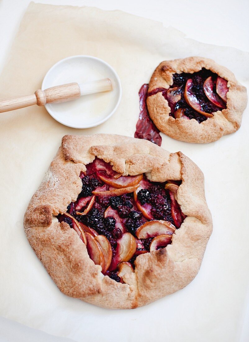 Two apple and blackberry galettes