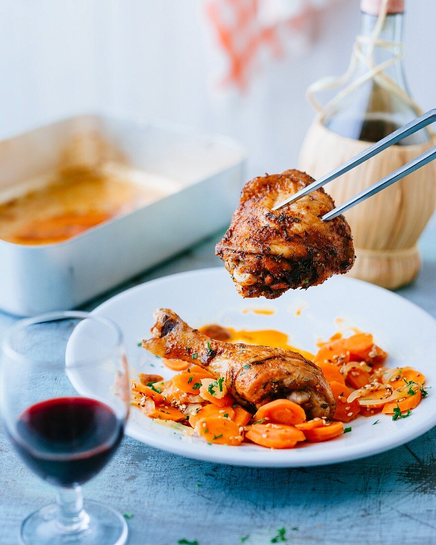 Chicken legs with sesame seed carrots