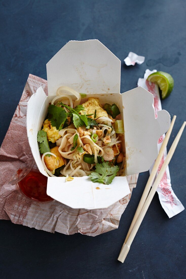 Pad Thai (rice noodle dish, Thailand) in a takeaway box