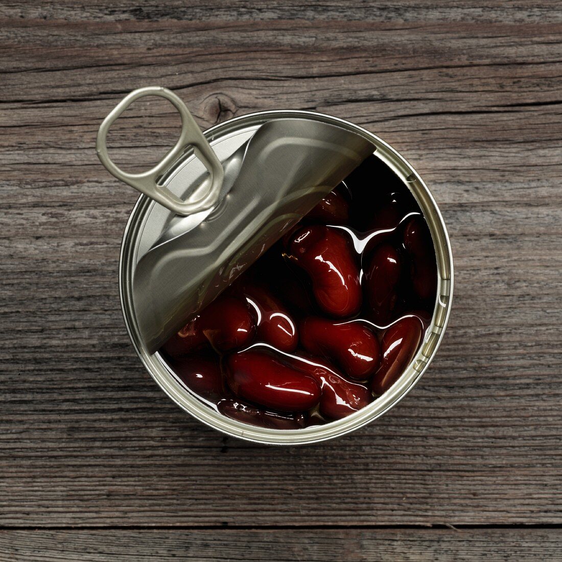 An opened tin of kidney beans