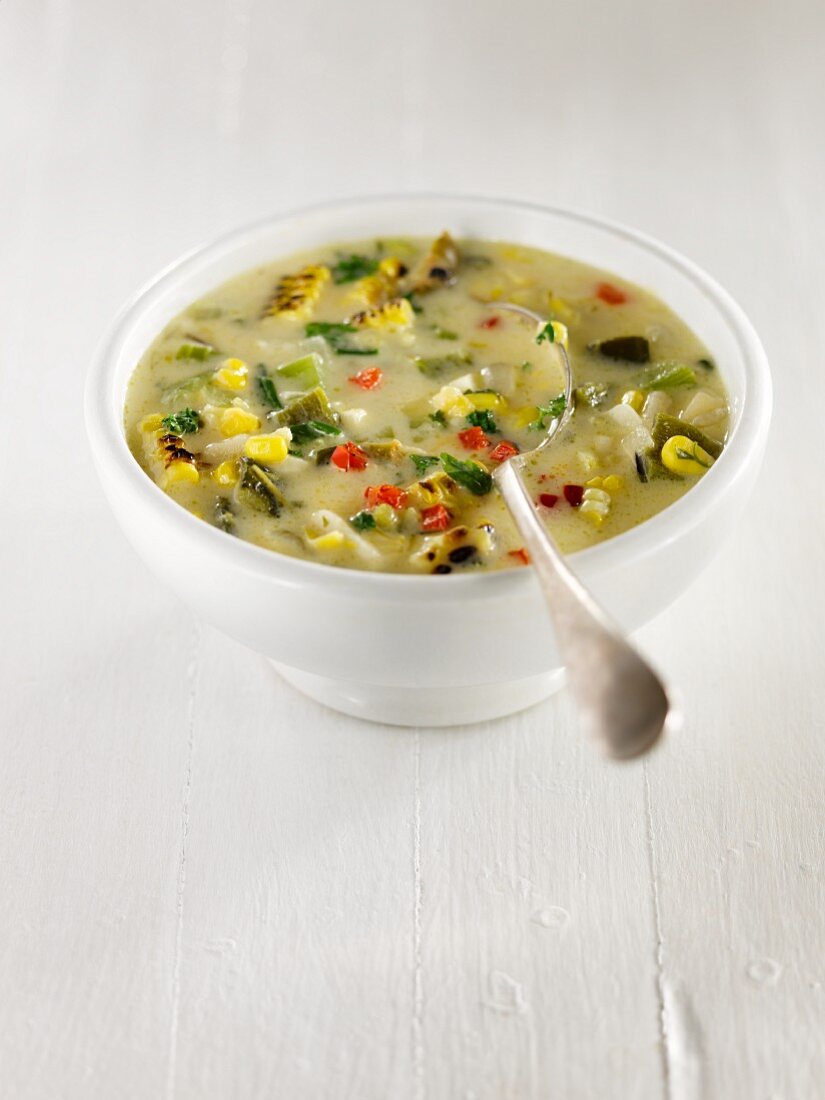Corn Chowder with potatoes, red and green peppers, celery, parsley and onions