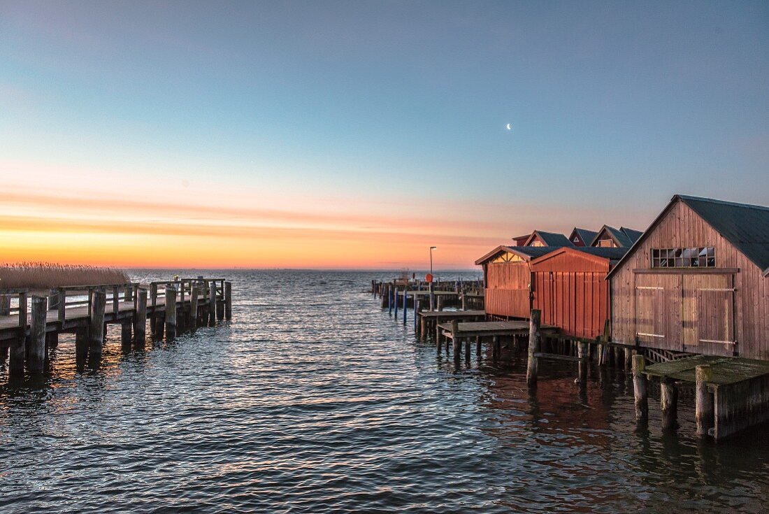 Fishermen's huts by sunrise in Ahrenshoop on the Baltic Sea