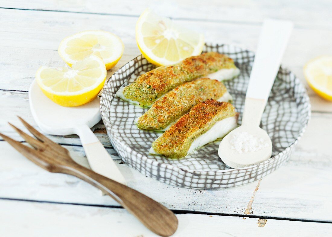 Raclette-baked fish with a breadcrumb coating