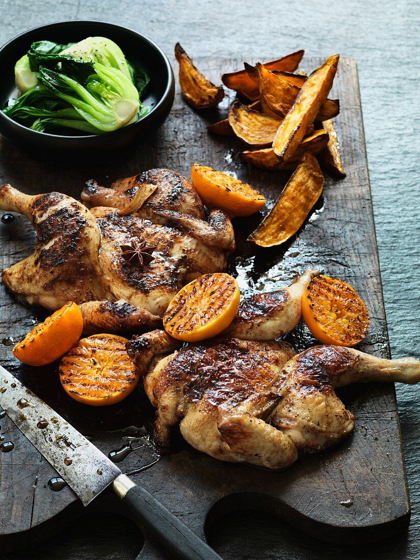 Spiced poussins with grilled clementines (Asia)