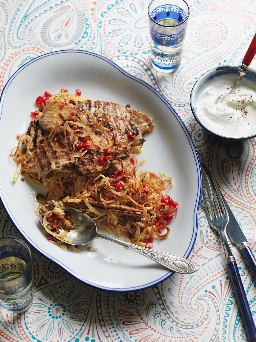 Turkey breast with spicy pomegranate rice and yogurt (Morocco)