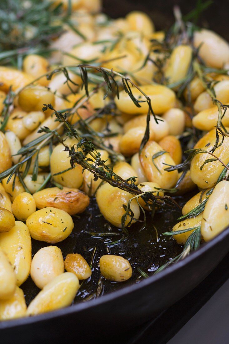 Rosemary potatoes in a pan (detail)