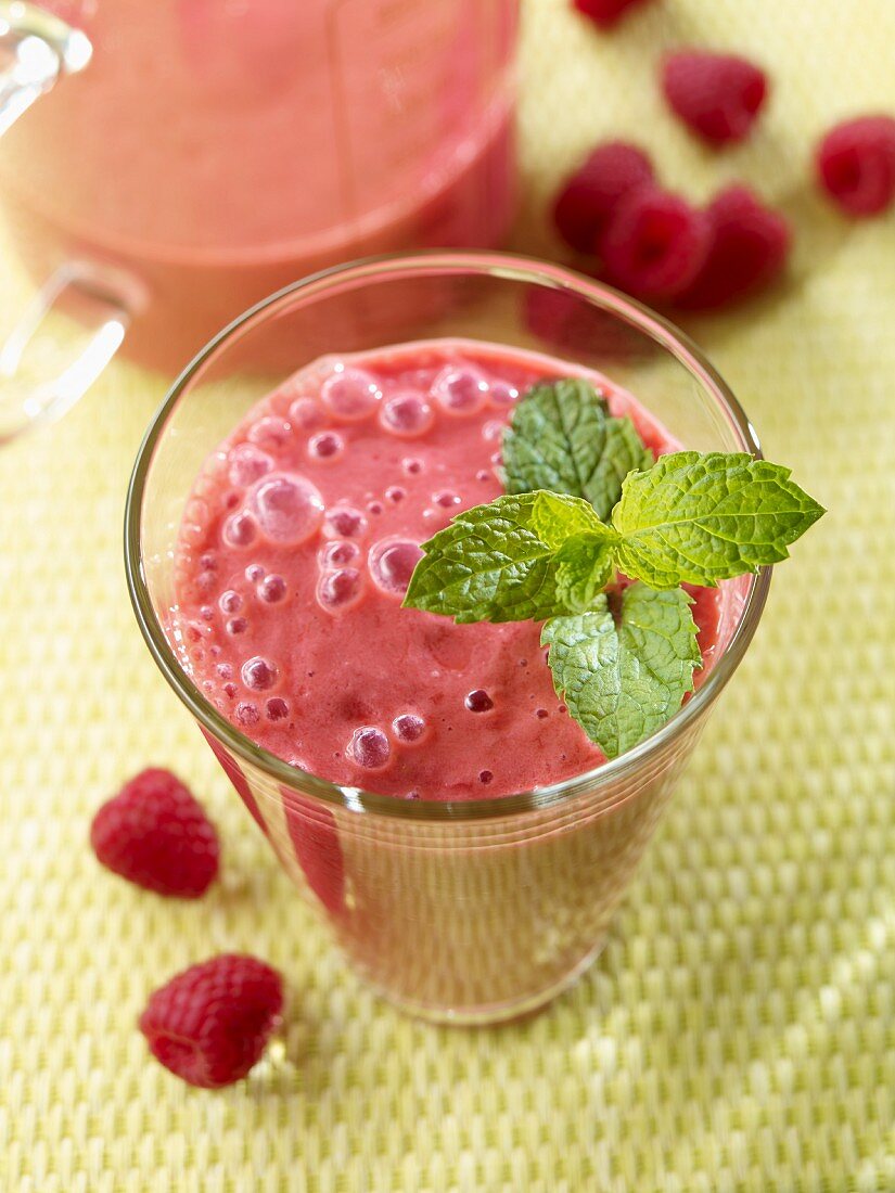 A yoghurt and raspberry shake with mint