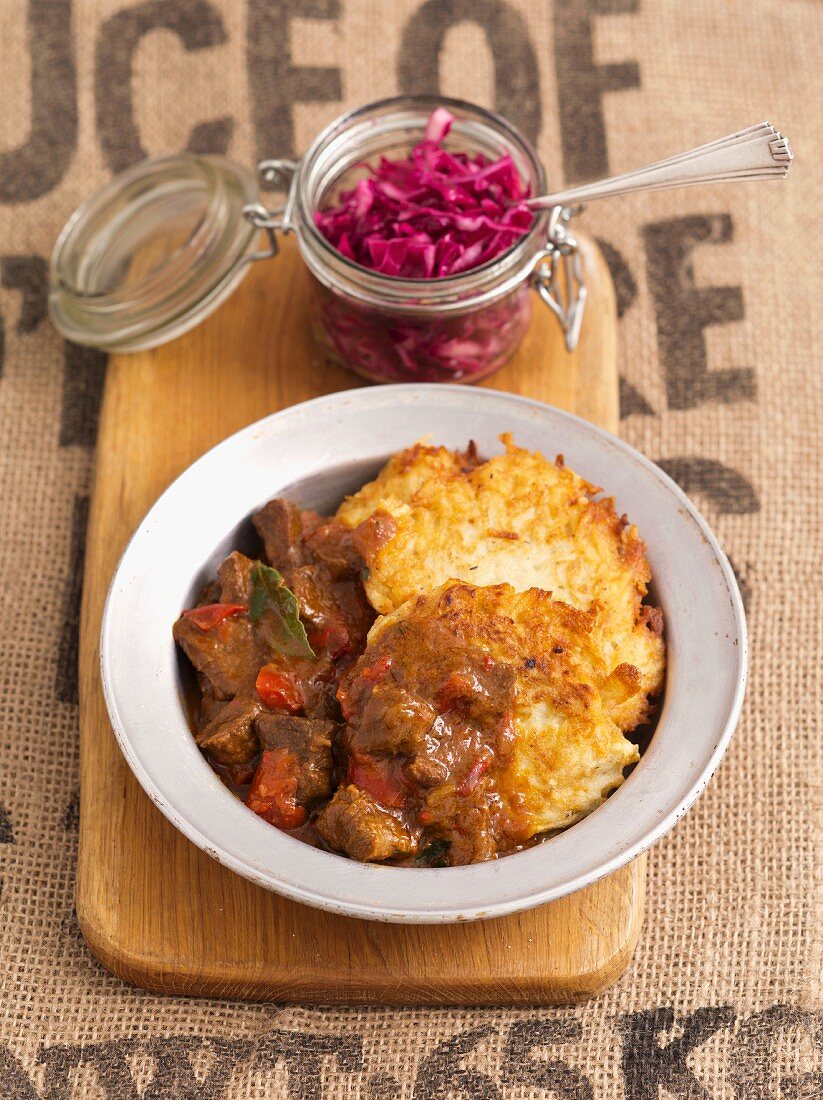 Potato cakes with beef goulash