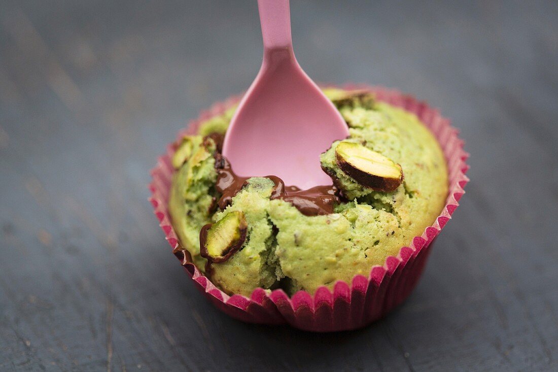 A pistachio muffin filled with chocolate