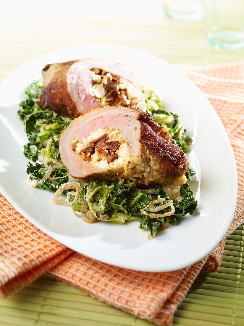 Stuffed veal roulade with a green kale medley