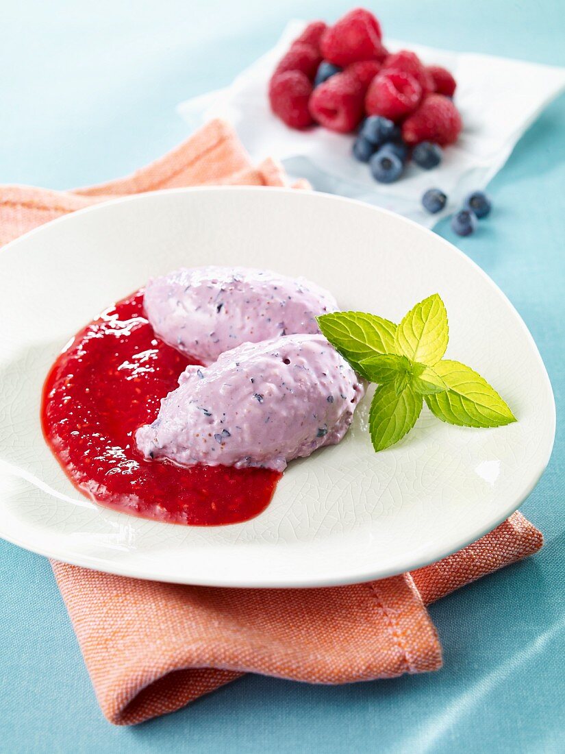Blueberry quark dumplings with raspberry sauce