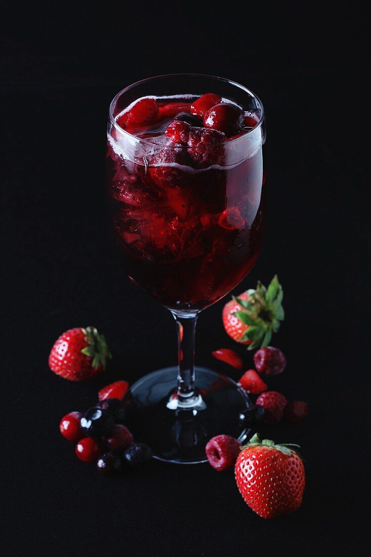 A berry cocktail in a glass