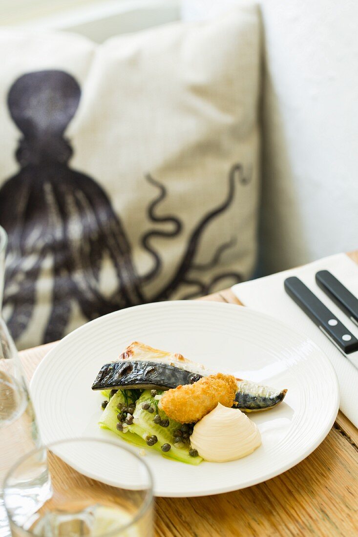 Grilled mackerel with cucumber strips and capers in the Outlaw's Fish Kitchen restaurant (Port Isaac, Cornwall)