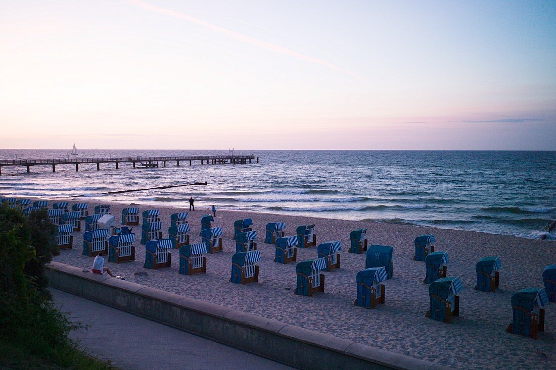 Beach chairs by dusk on the sandy beach in Kühlungsborn, Rostock, Mecklenburger Bay