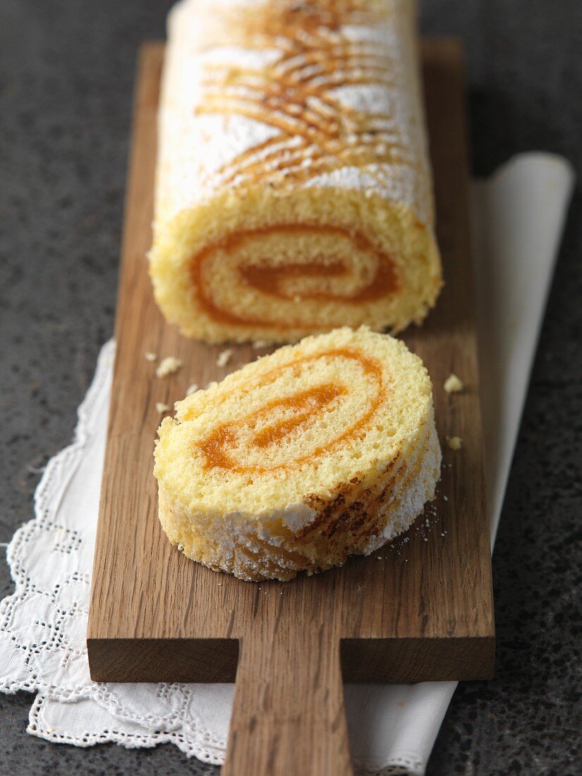 Swiss roll with apricot jam, sliced