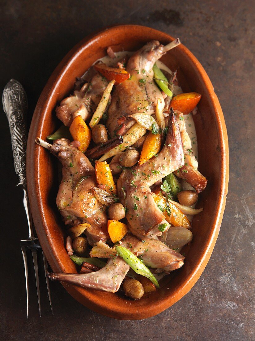 Rabbit braised in white wine with carrots and chestnuts