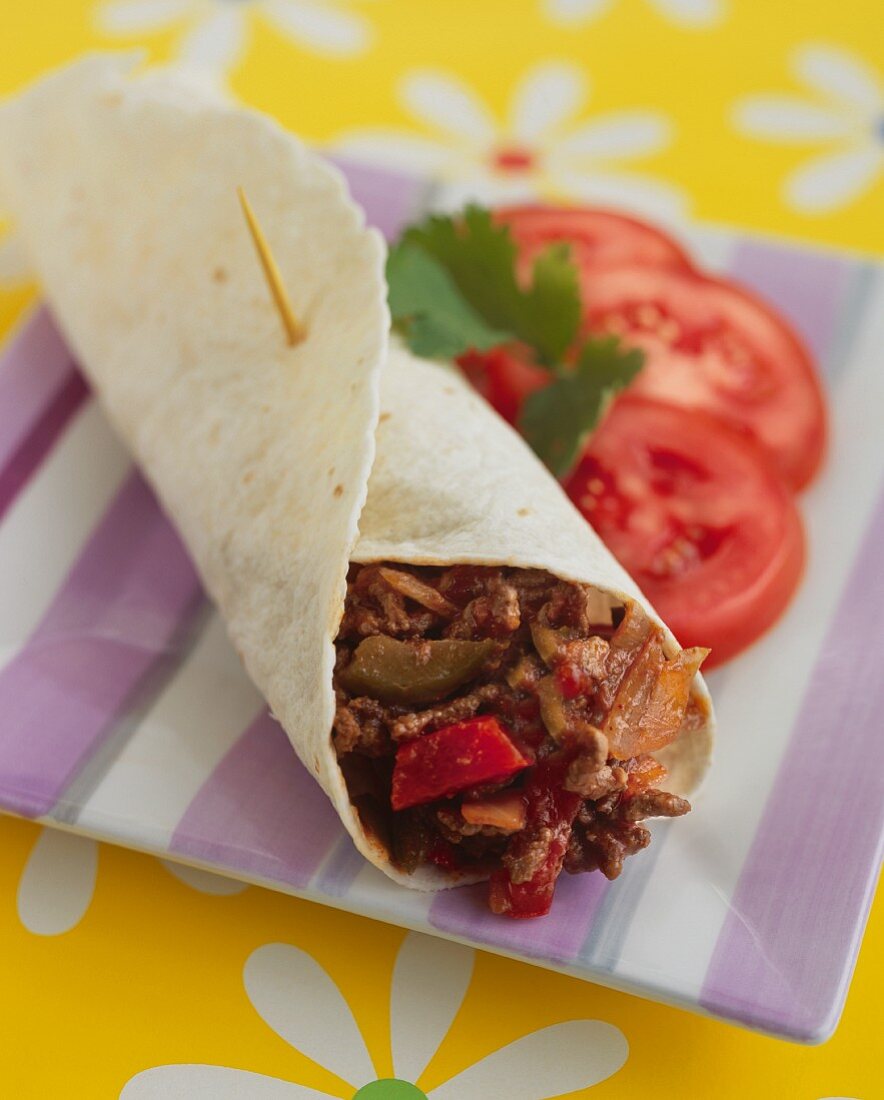 A beef wrap with peppers